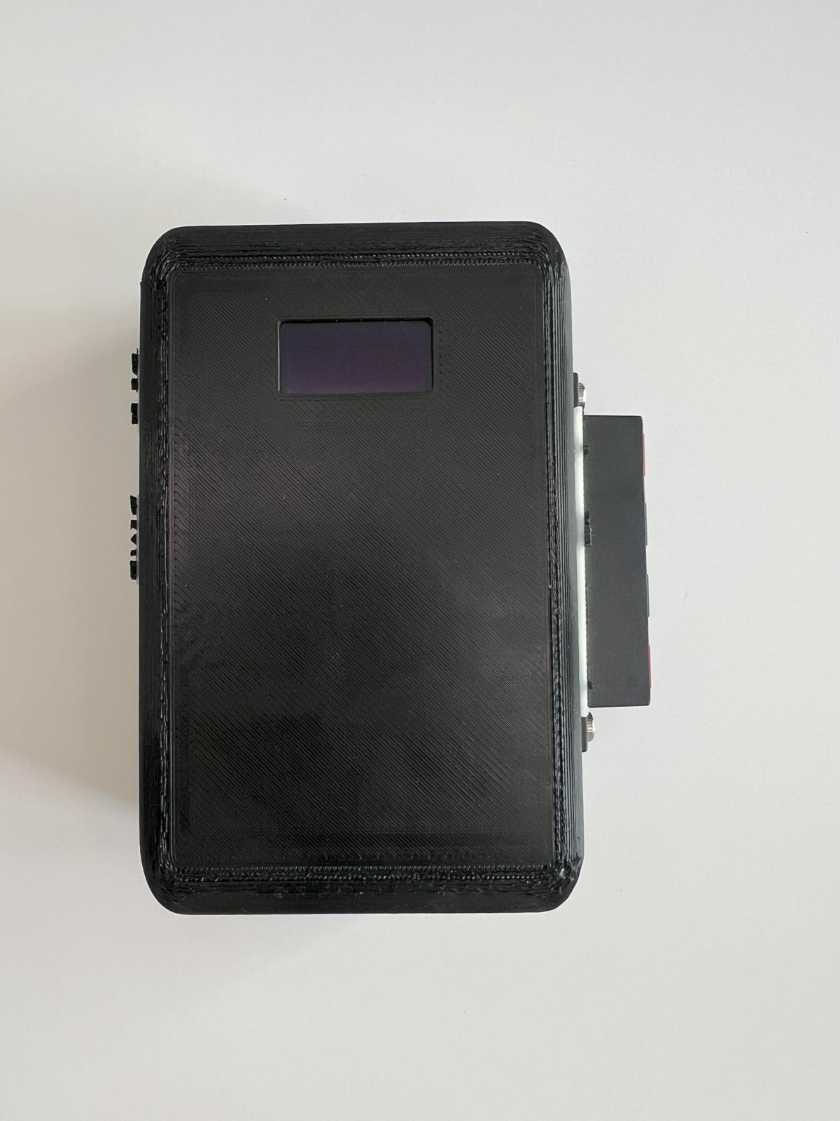 Assembled ESPiezometer device, front view with OLED display